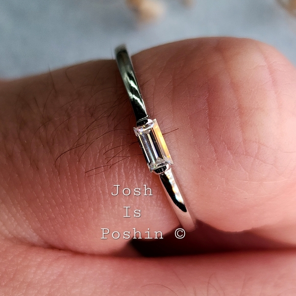 Bezel set emerald cut moissanite in 18k gold over sterling silver